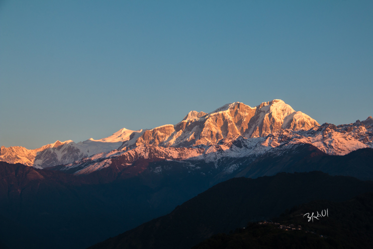 Lamjung Himal lit up by morning sun.